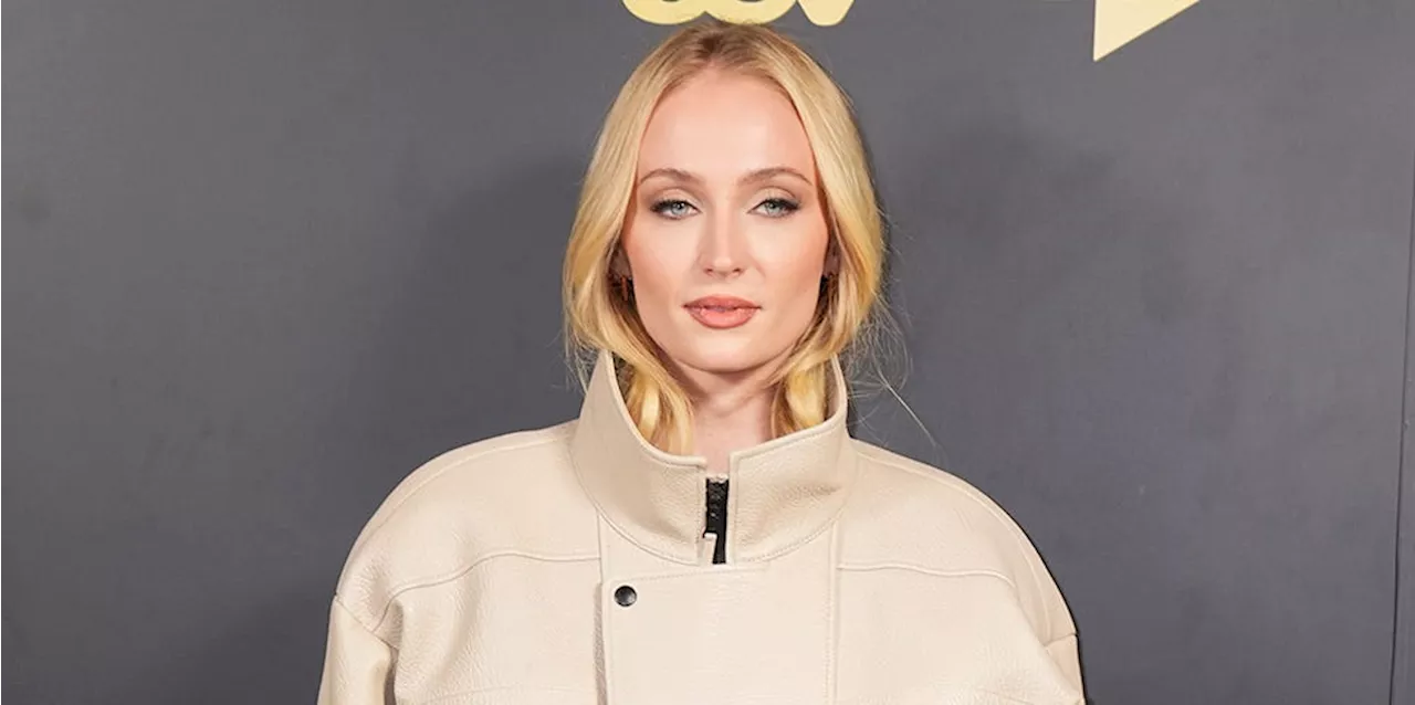 Sophie Turner Looks Like a Sultry ’80s Diamond Thief in This Monochrome Beige Leather Set