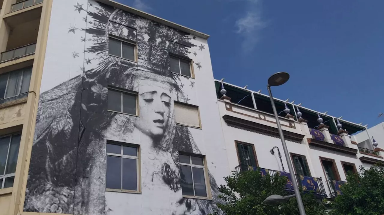 El mural con la Virgen de La Estrella que cubre un edificio de Triana