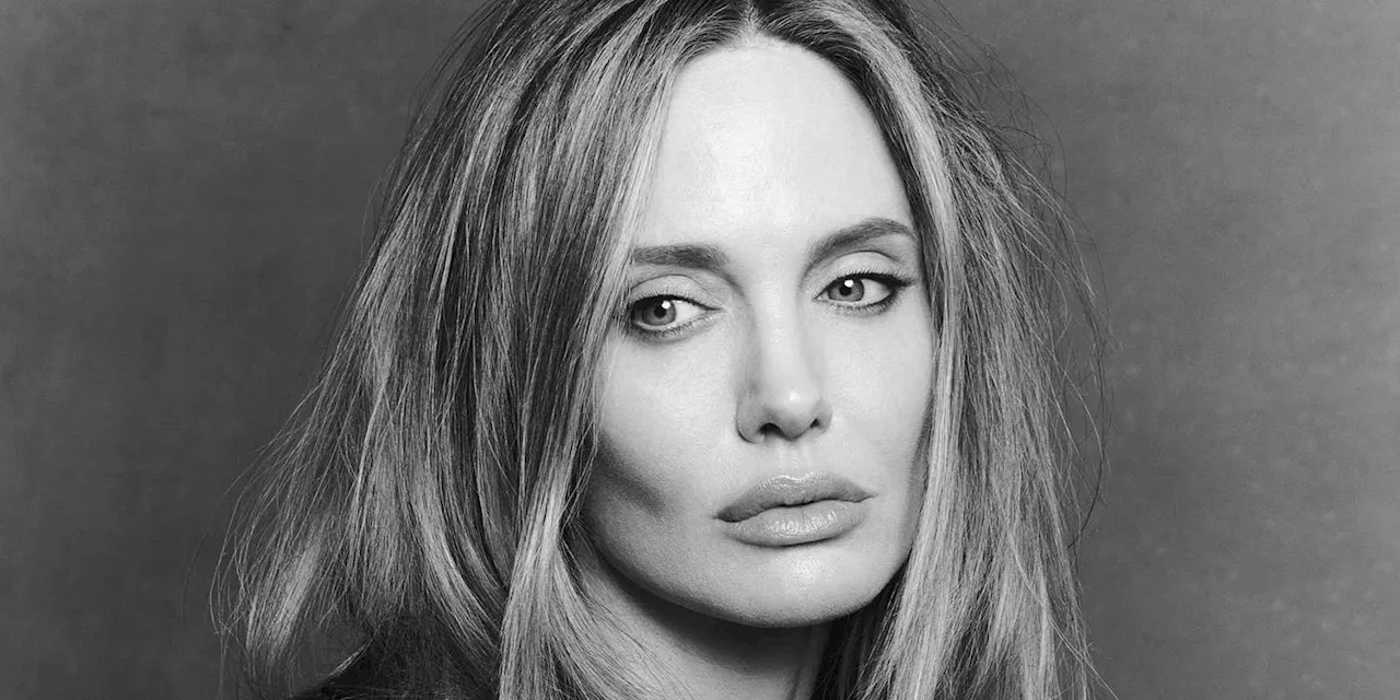 Angelina Jolie Looks Almost Unrecognizable With Big, Curly Hair