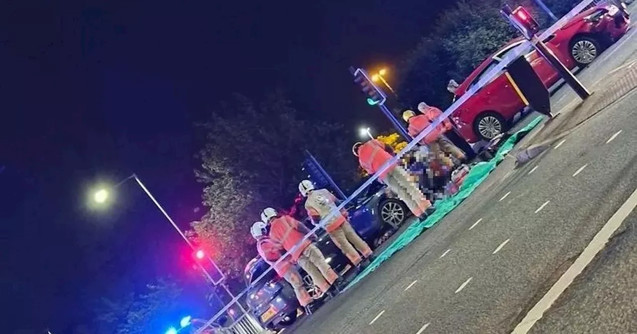 Woman rushed to hospital after three-car crash at busy junction