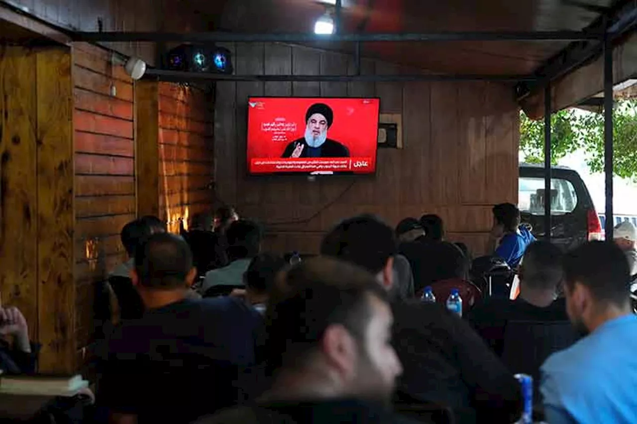 Hezbollah leader vows retaliation against Israel for attacks on devices as both sides trade strikes