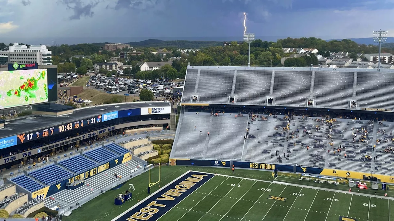 Garrett Greene throws two late TD passes and West Virginia beats Kansas 32-28