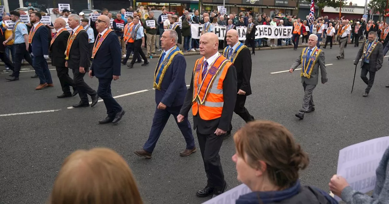 Orange Order parade in north Belfast passes peacefully despite local protests