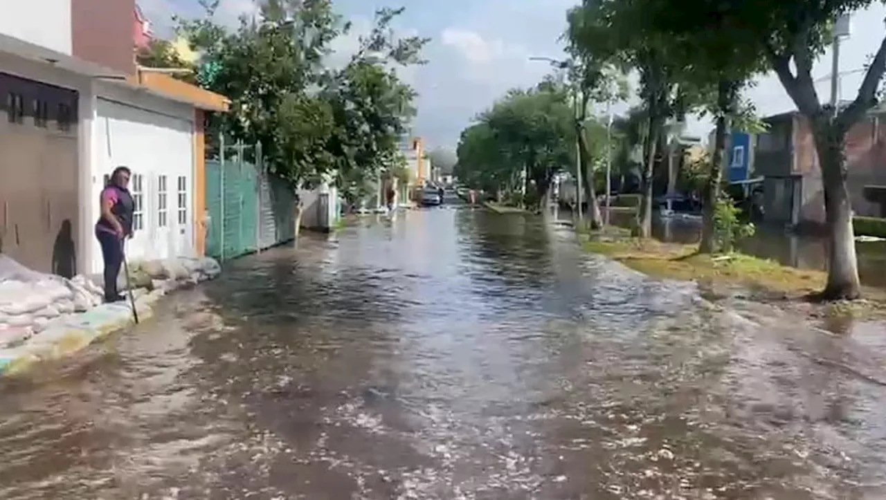 Inundaciones obligan a cientos de familias a abandonar sus hogares en Morelia, Michoacán