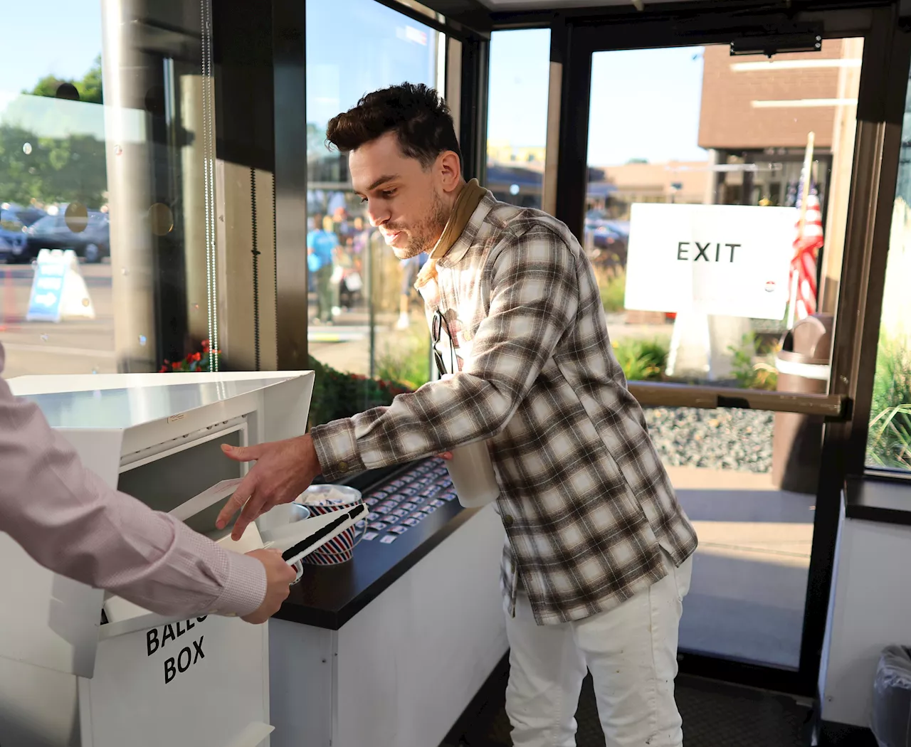 Voters Cast Early Ballots Amid Concerns Over Election Security