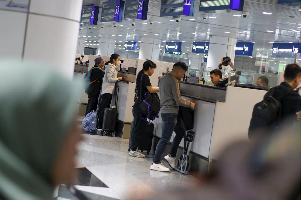 Immigration Dept to implement workplace rotation to stop 'counter setting'