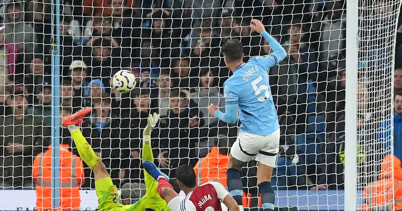 John Stones rescues Manchester City with late equaliser against 10-man Arsenal