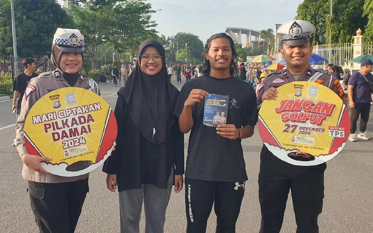 Cara Unik Satlantas Polresta Pekanbaru Sosialisasi Pilkada Damai di CFD