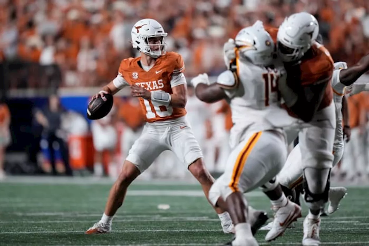 No. 1 Texas keeps rolling behind Manning and Blue and routs ULM 51-3 in last game before SEC play