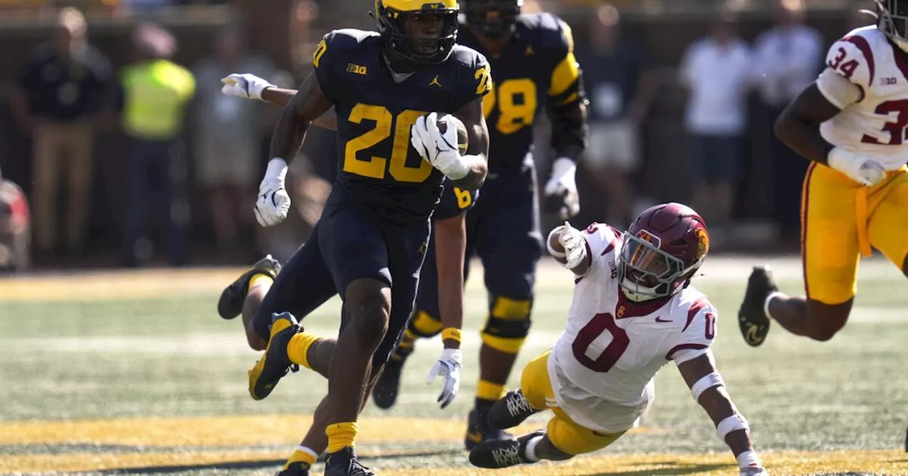 Michigan scores late to defeat USC in physical Big Ten opener