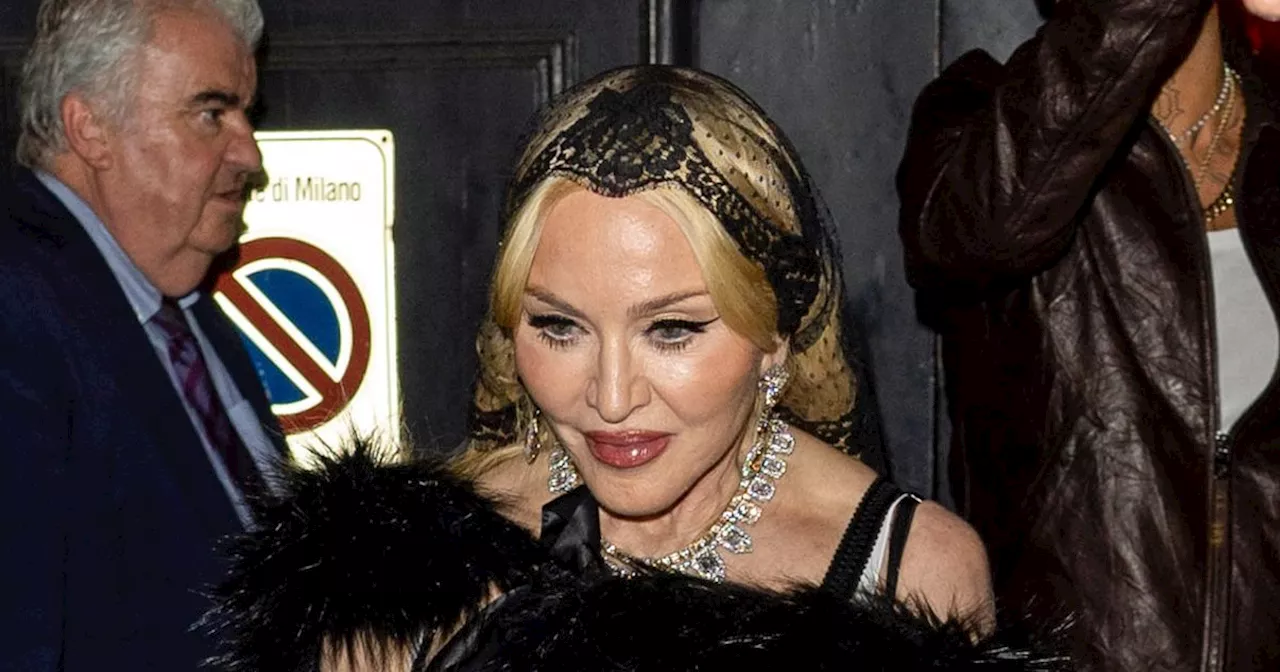 Madonna looks ageless as she steps out in risqué outfit at Fashion Week party