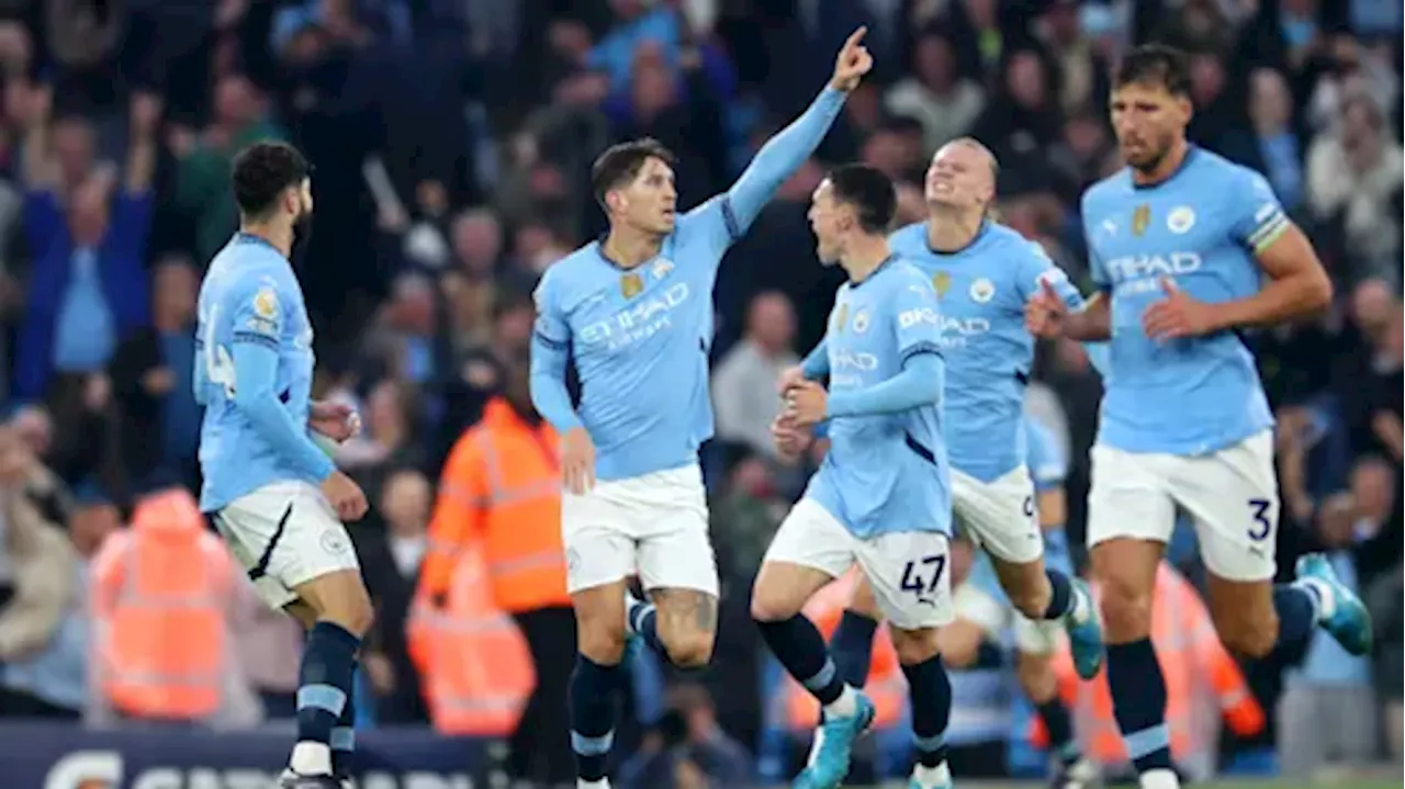 Stones salvages point for Man City against 10-man Arsenal