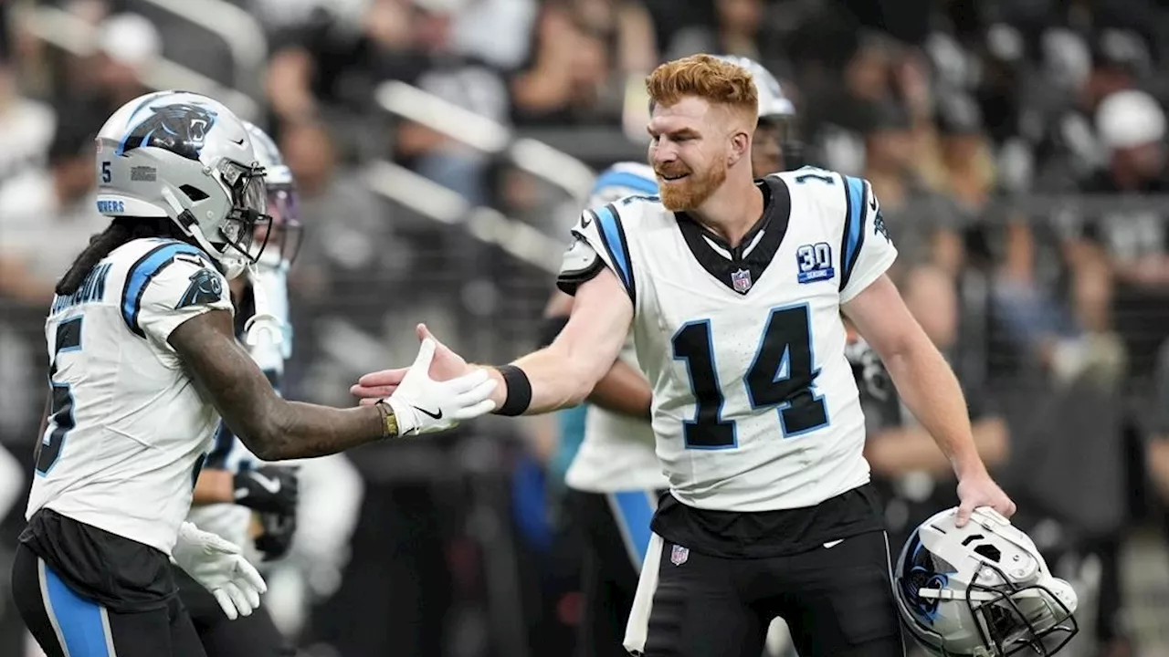 Dalton passes for 319 yards, three TDs to lead Panthers past Raiders for first win