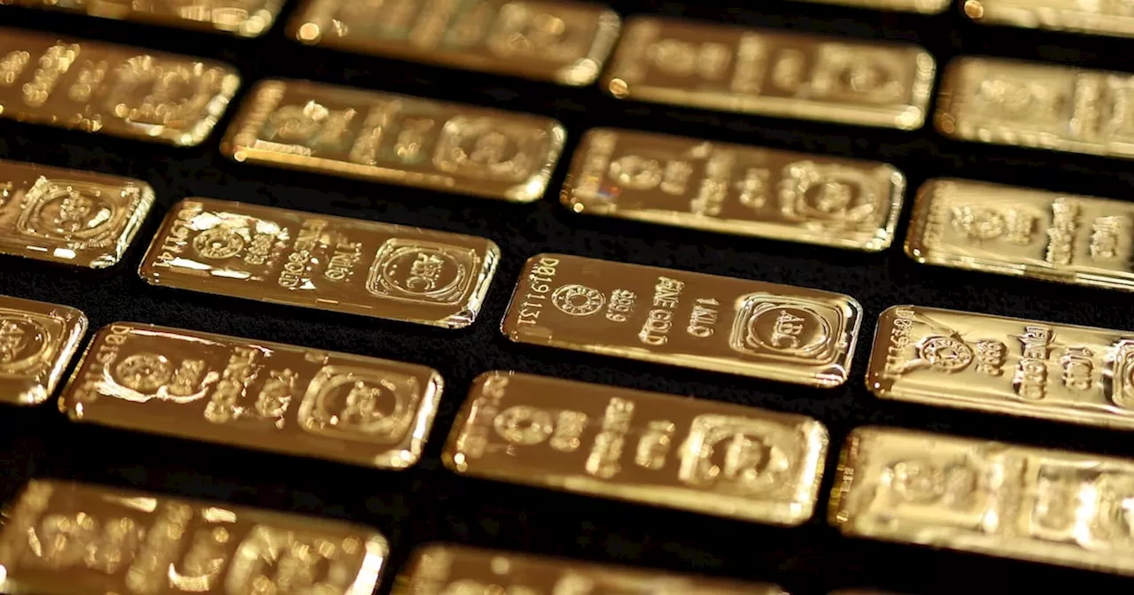 Gold Rises to Fresh Record Before Data That May Offer Fed Clues