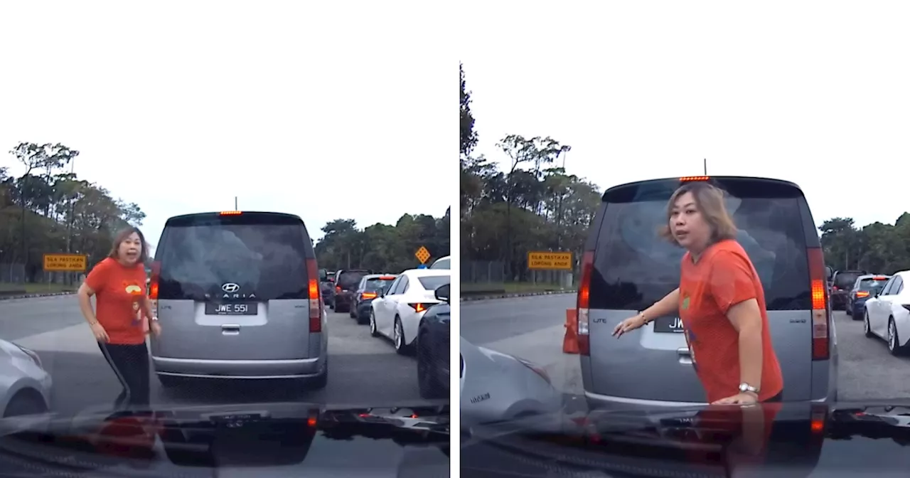 Woman Jumps In Front Of Car To Let Husband Merge