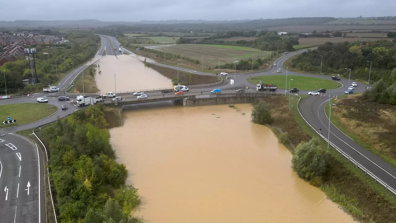 Britain underwater after MONTH of rain: Homes are flooded, football matches cancelled, schools close...