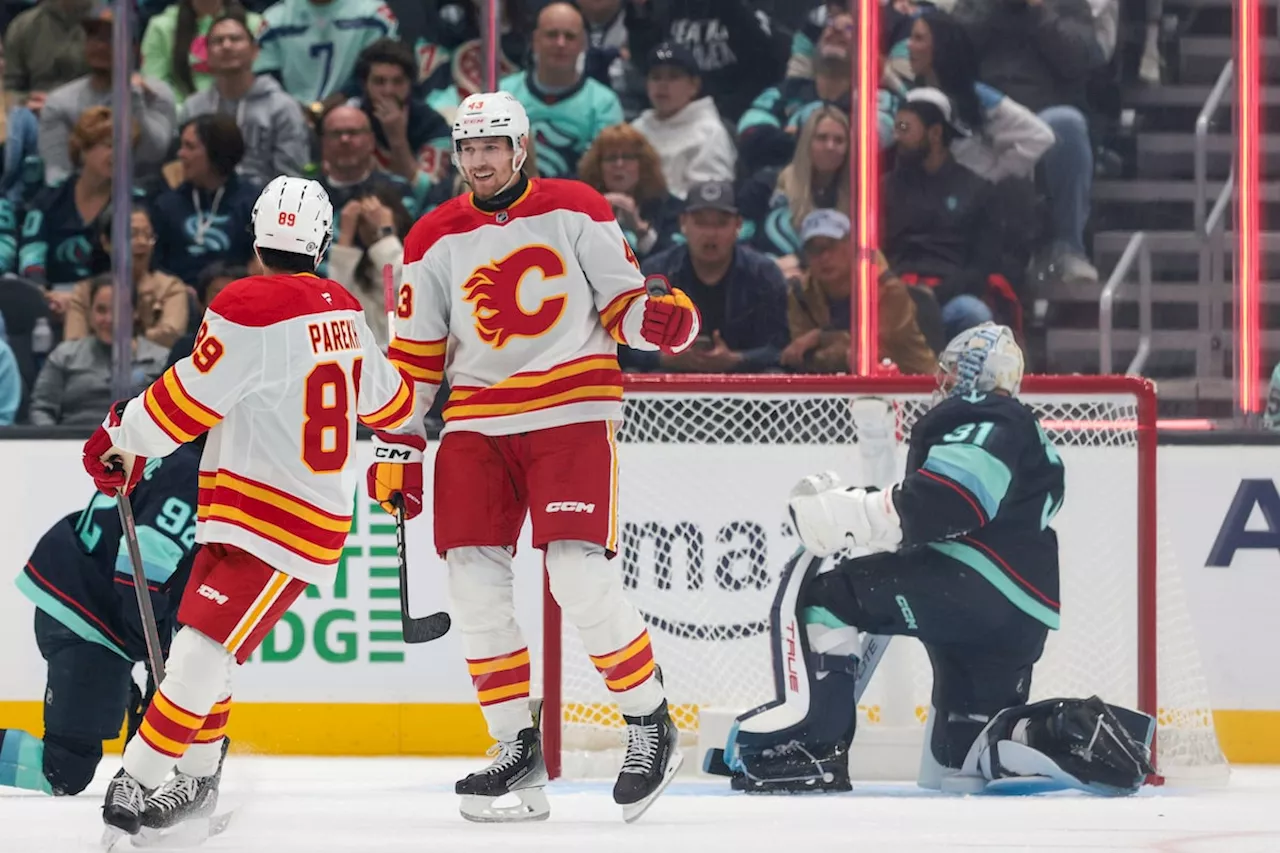 Flames jump out to a hot start, burn Kraken 6-1