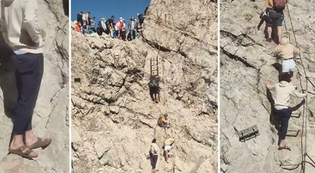 Turista con le Birkenstock sulla ferrata, il video fa discutere. Gli esperti: «Poca consapevolezza dell'ambien