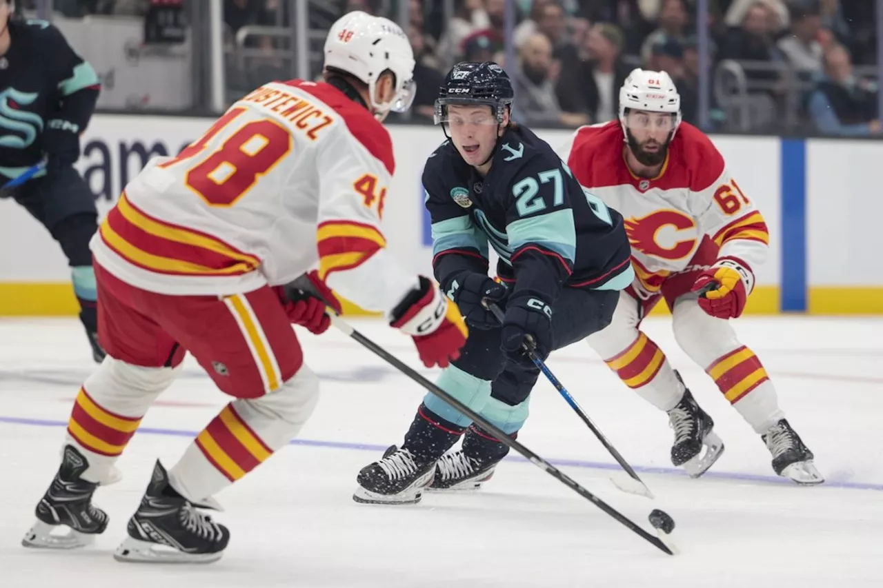 Flames jump out to a hot start, burn Kraken 6-1