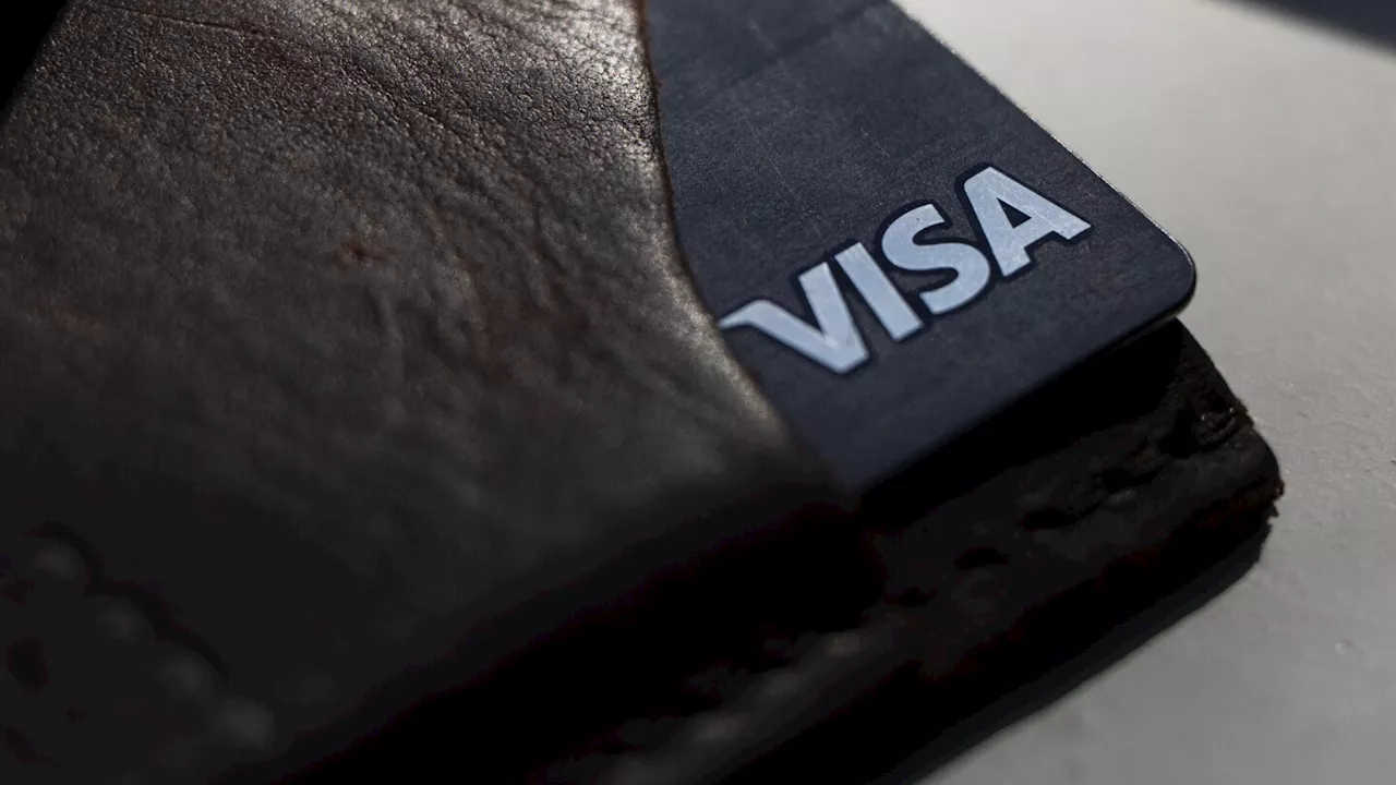 Department of Justice sues Visa, saying the card issuer monopolizes debit card markets