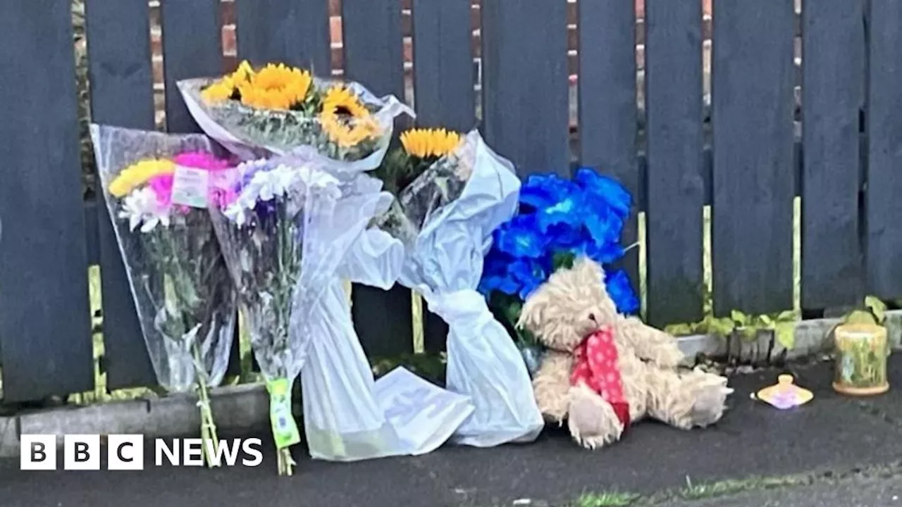 Salford: Woman and girl, 8, found dead at home identified