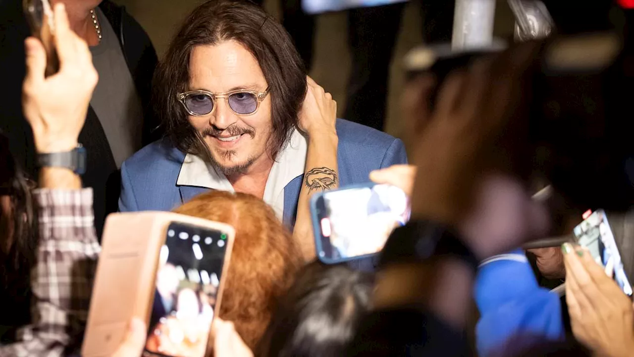 Johnny Depp greeted by fans ahead of new film premiere in Spain