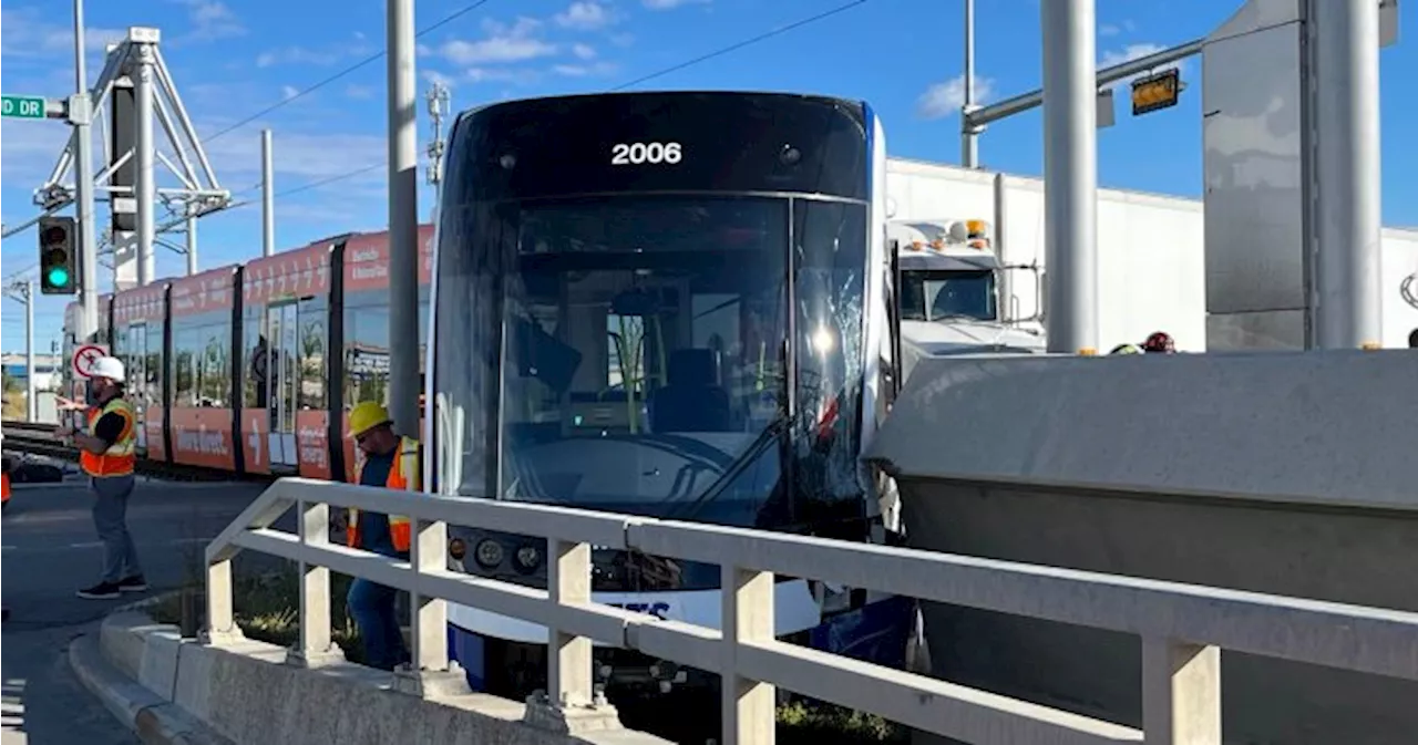 Semi turning against light and Valley Line LRT collide in southeast Edmonton