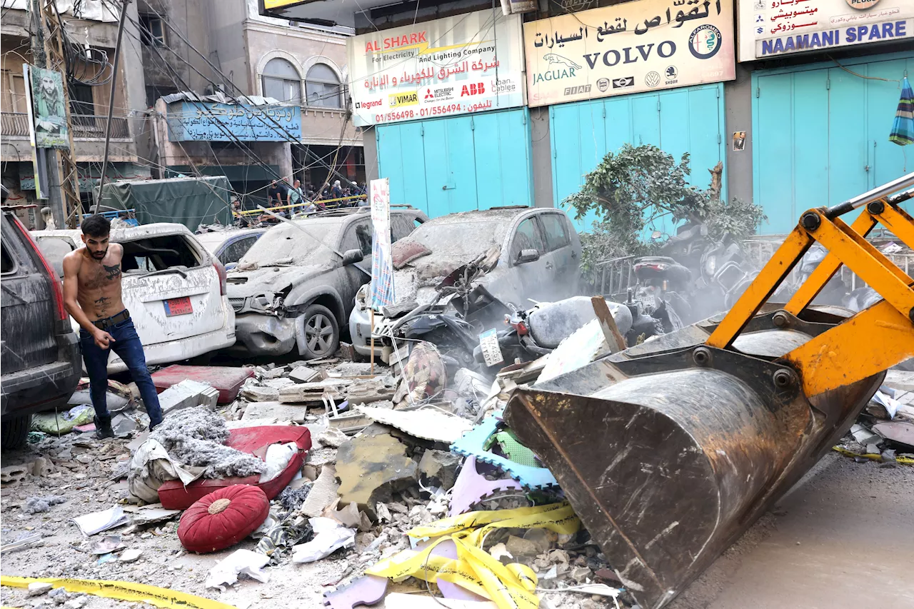 In photos: Thousands flee southern Lebanon as Israel and Hezbollah fighting continues