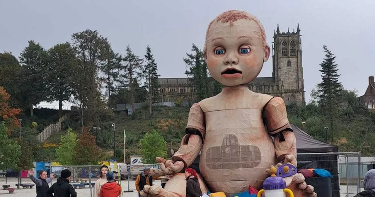 'Creepy' giant baby turns up in town centre and 'terrifies' locals