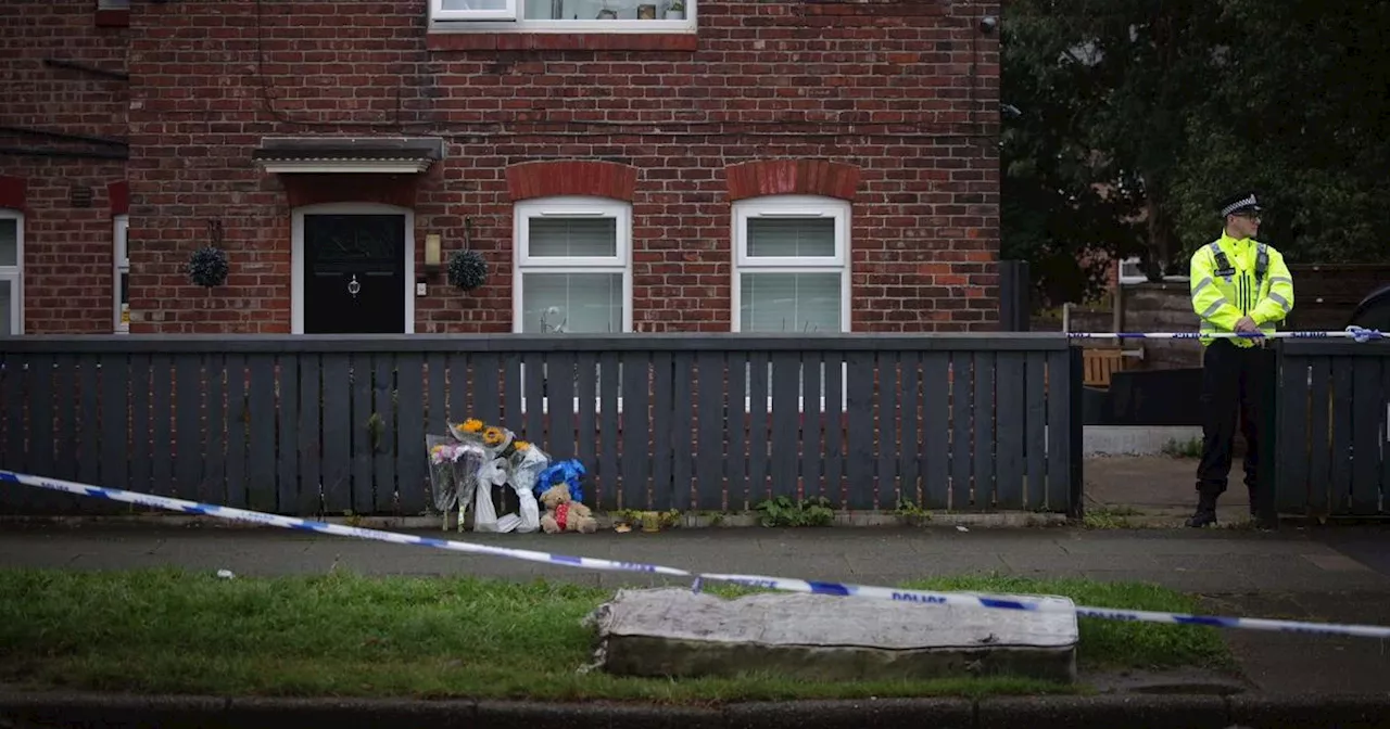 'Heartbreaking': Tributes left outside home where woman and girl, 8, found dead