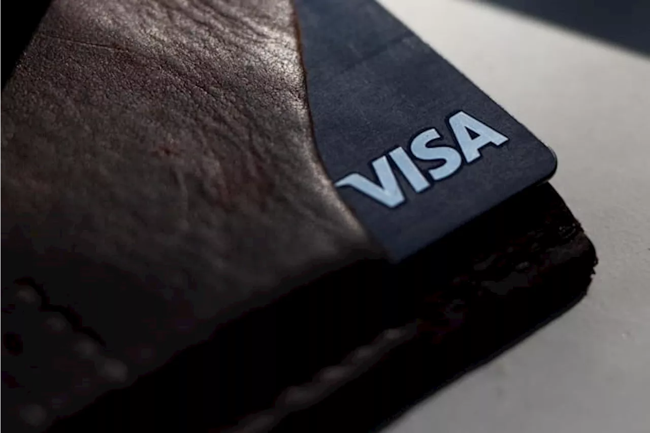 Department of Justice sues Visa, saying the card issuer monopolizes debit card markets