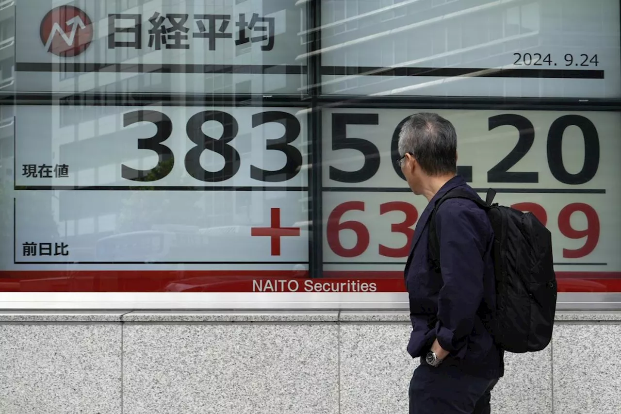 Stock market today: Asian shares gain as China eases rates to aid property industry