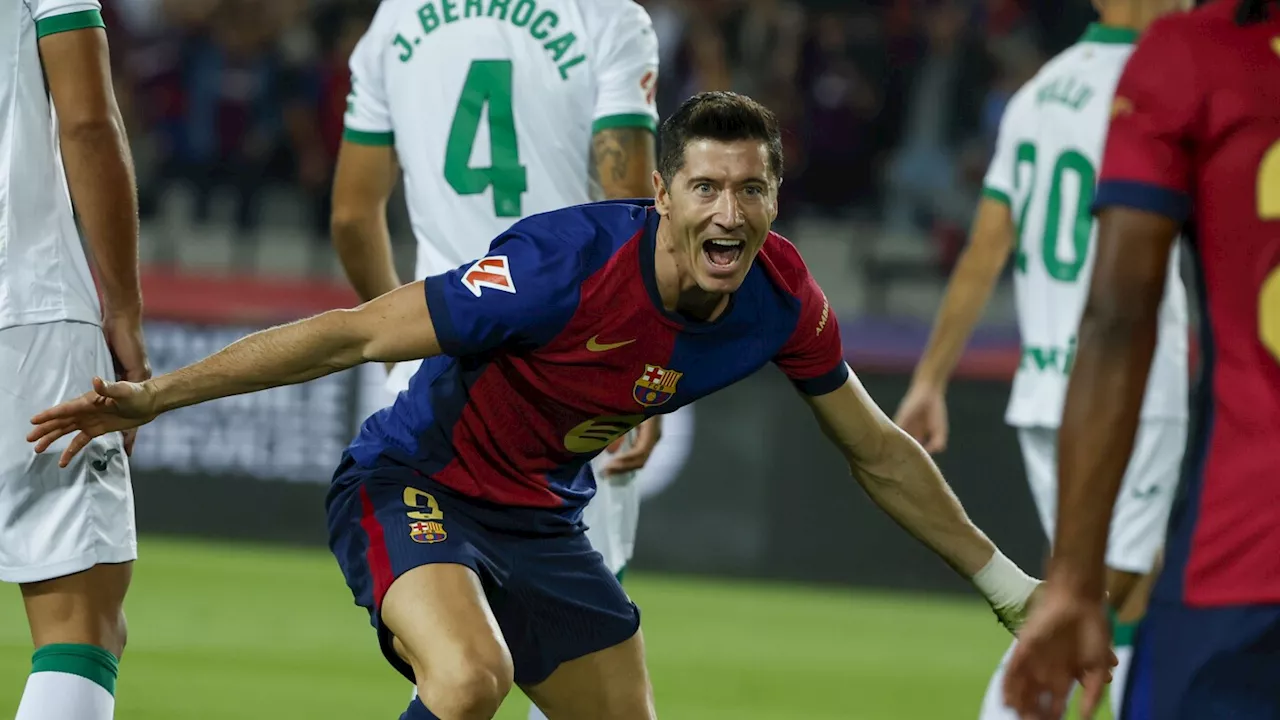 Lewandowski scores his 7th goal to give Barcelona its 7th straight win in Spanish league