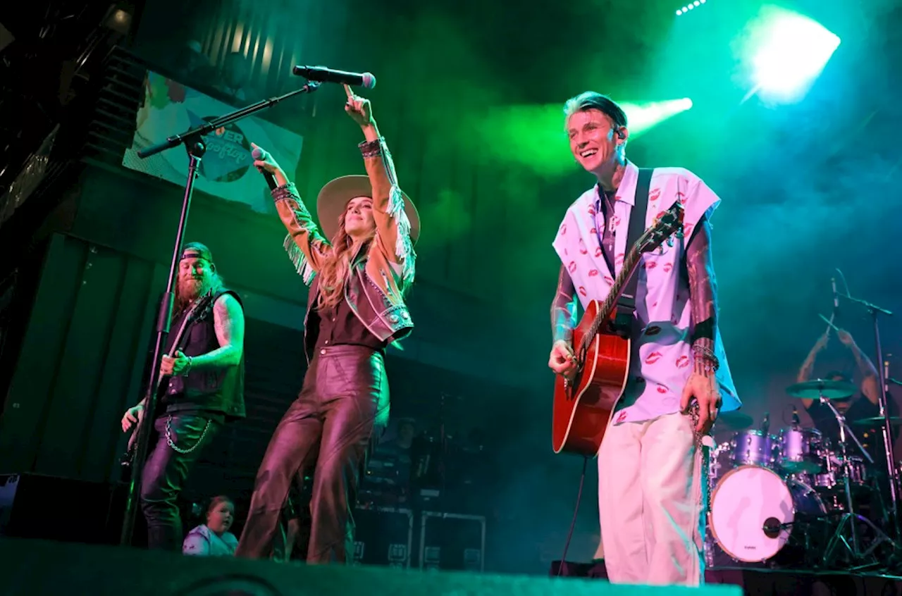 MGK Brings Out Lainey Wilson for Surprise Duet of ‘Lonely Road’ at Nashville Show: Watch