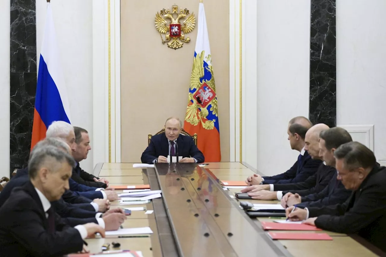 Putin lowers threshold of nuclear response as he issues new warnings to the West over Ukraine