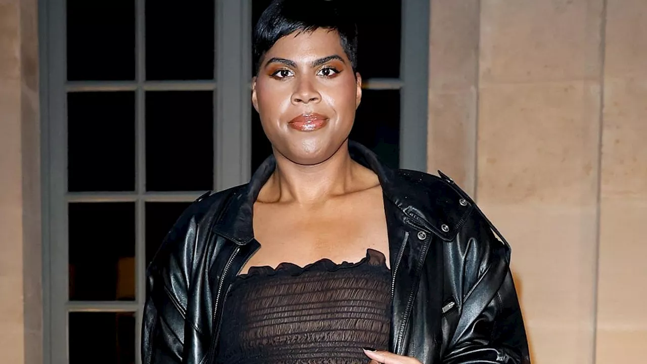 Basketball icon Magic Johnson's son EJ Johnson poses in sheer dress that flashes his underwear... 9...