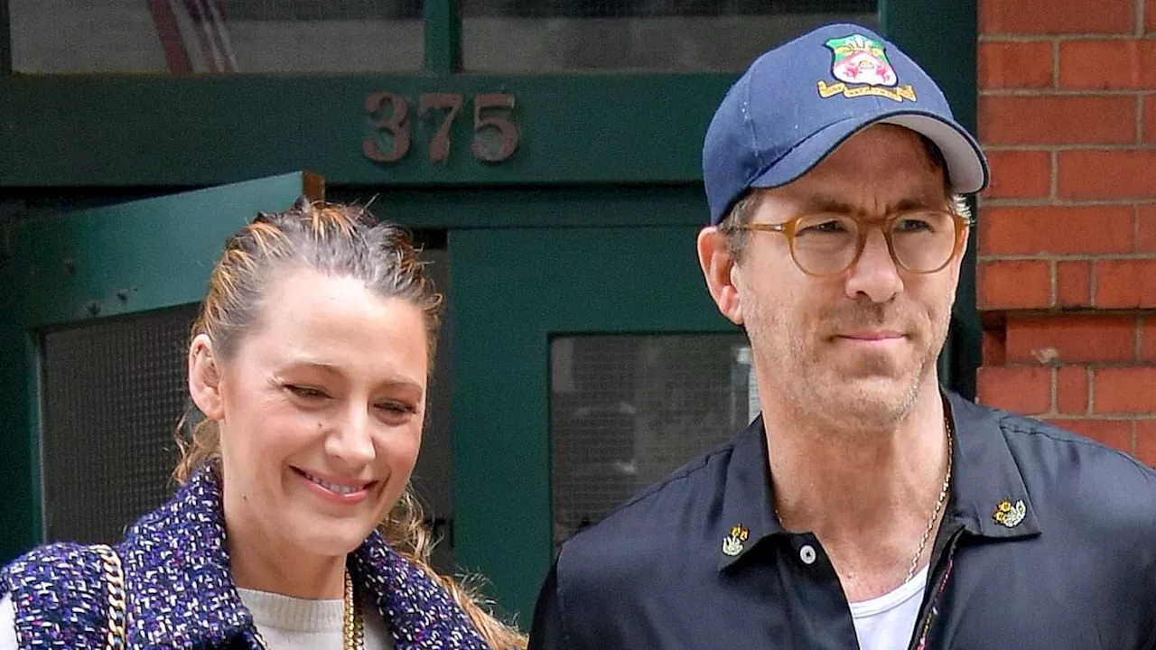 Blake Lively beams while walking arm-in-arm with husband Ryan Reynolds in NYC