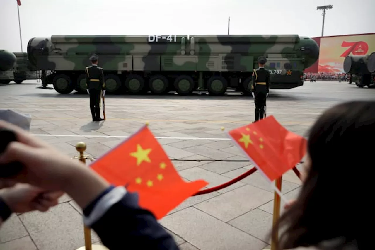 China test-fires an intercontinental ballistic missile into the Pacific Ocean