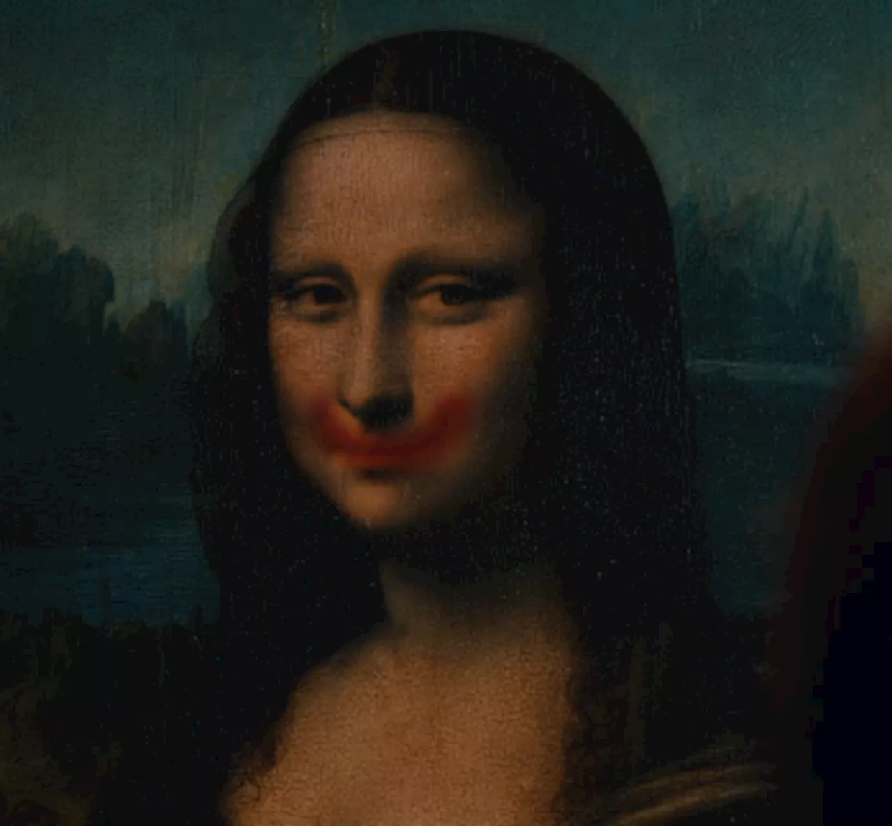 Lady Gaga plants lipstick smile on 'Mona Lisa' in Louvre clip