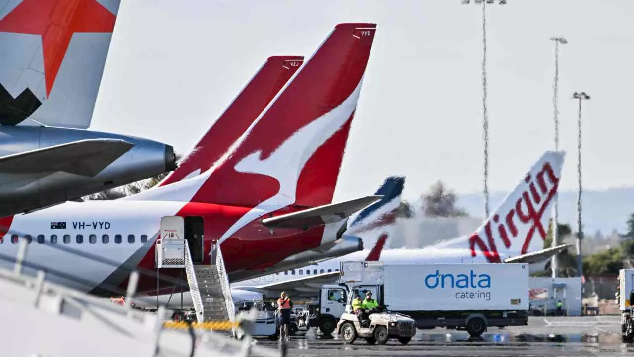 Travellers’ plans up in the air as Qantas workers strike