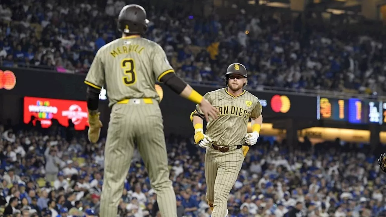 Padres turn triple play to clinch playoff spot with win over Dodgers