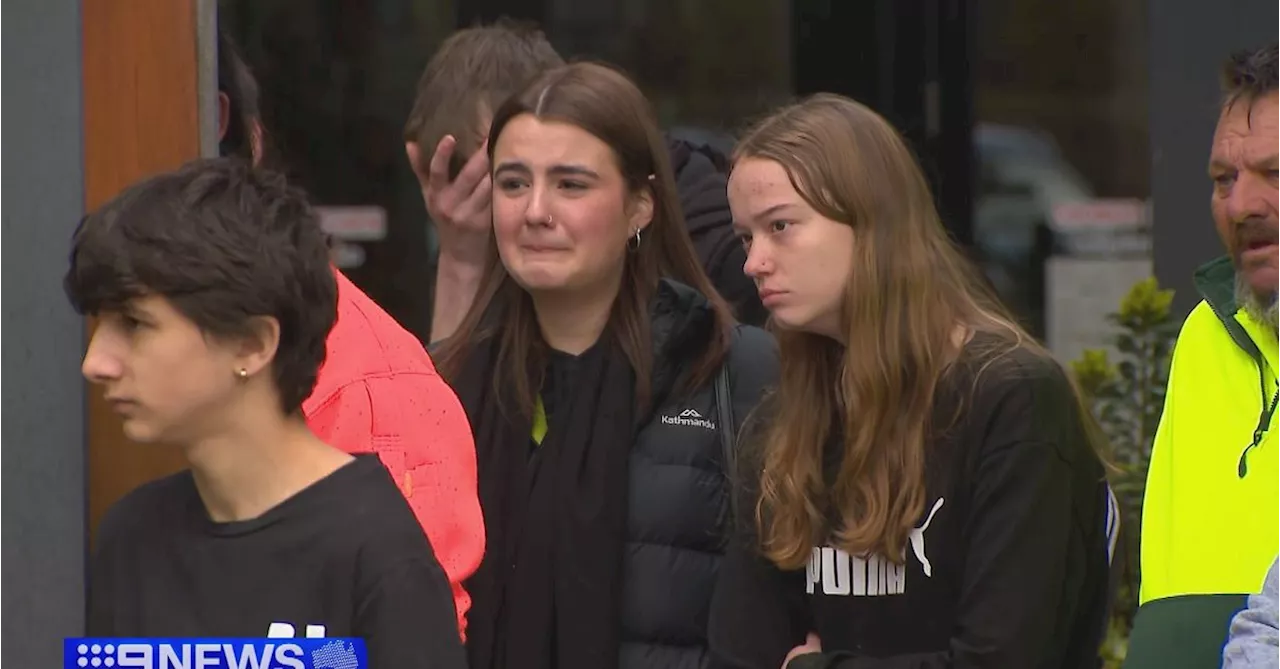 Loved ones gather at Melbourne shopping centre to honour teen stabbing victim