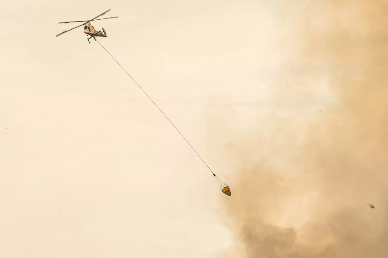 Grand Forks wildfire alert downgraded as Washington fire threatens border