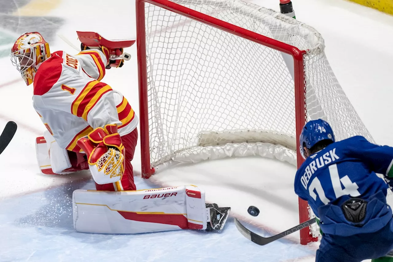 DeBrusk scores second goal in overtime to give Canucks pre-season win over Flames