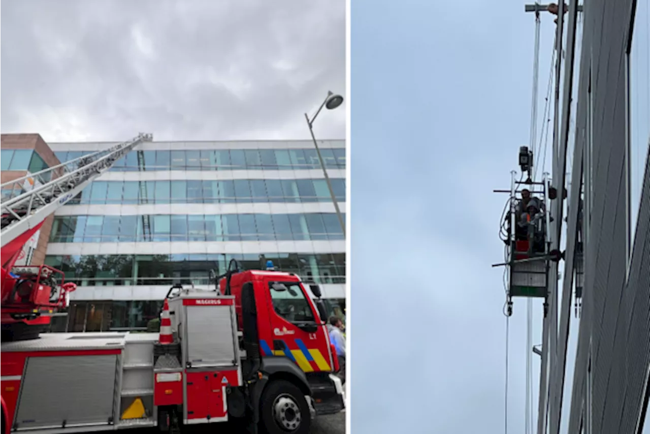 Twee ruitenwassers in de problemen in Mechelse stationsbuurt: klimteam brandweer redt hen uit benarde situatie