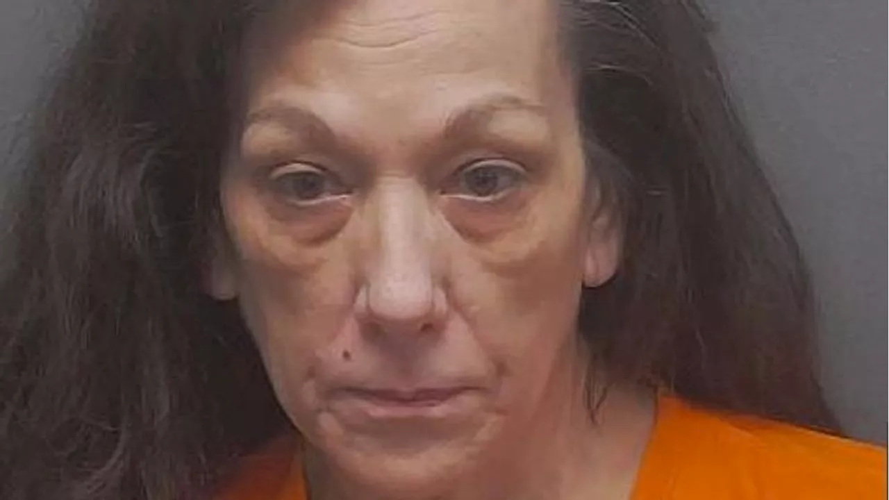 Woman charged with murder after she beat her husband to death, report says