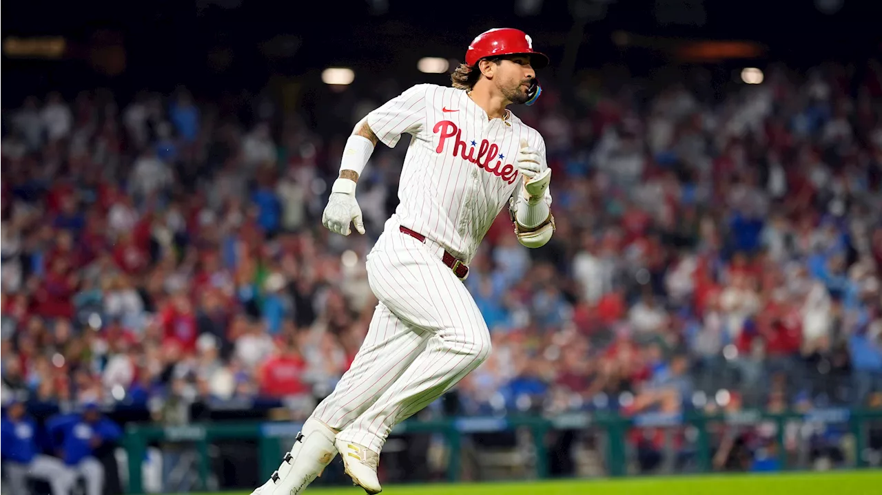 Castellanos homers as Phillies beat Cubs and clinch first-round bye in playoffs