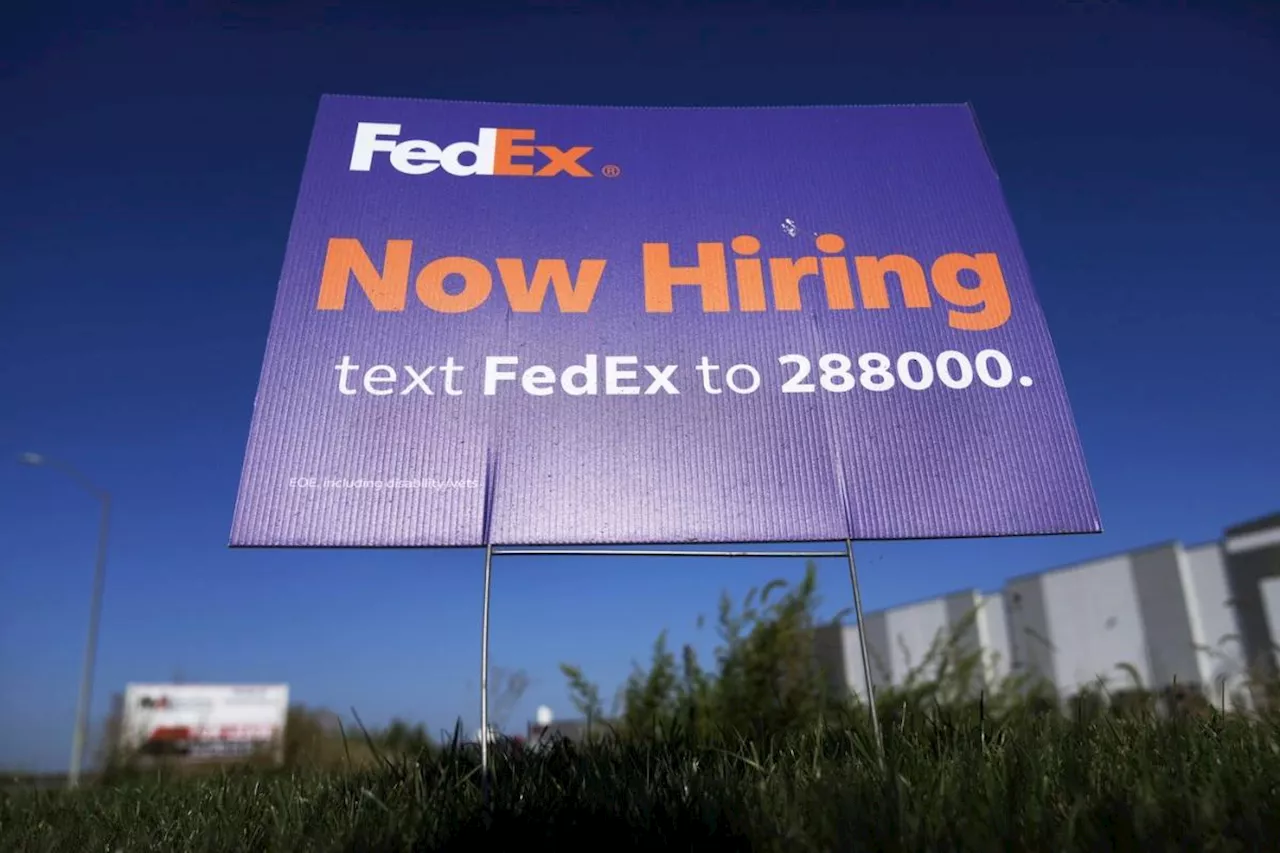 The number of Americans filing for jobless aid falls to lowest level in 4 months