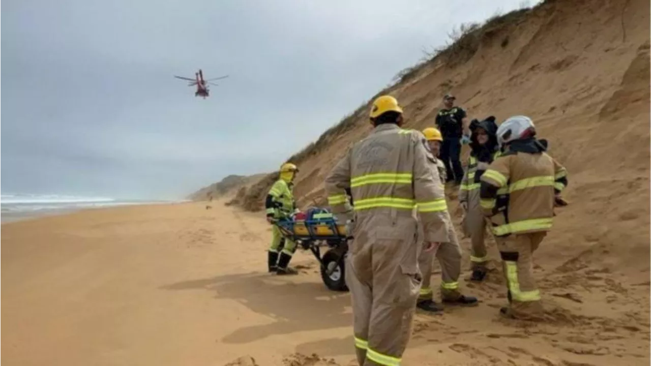 Man with two broken legs rescued after 30m cliff fall during coastal dog walk at Warrnambool