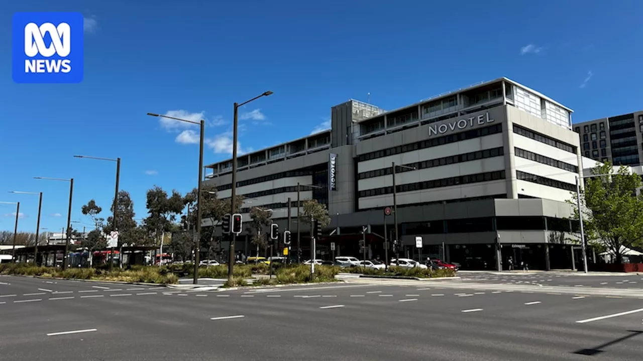 Man breaks into Canberra hotel lobby after allegedly hiding in a ceiling cavity in attempt to escape arrest